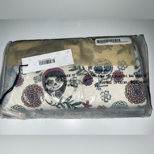 Brand new Disney, Dooney, and Bourke Coco wallet new with tags.